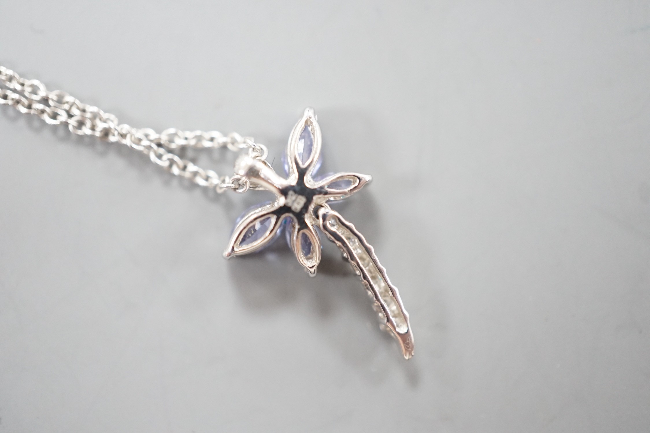 A modern Italian 18ct white gold, tanzanite? and diamond set dragonfly pendant necklace, pendant, 18mm, chain 43cm, gross weight 3.3 grams.